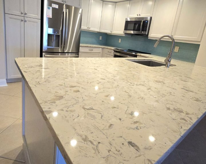 Modern kitchen with marble quartz countertop and backsplash
